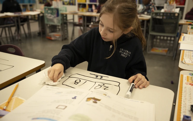 A Central Florida Prep student working on a classroom project