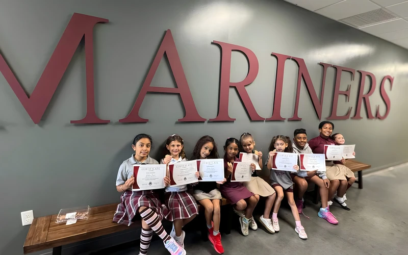 Central Florida Prep students in front of the Mariners wall